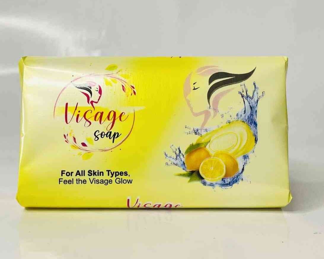 Lemon Soap bar with fresh lemon slices.